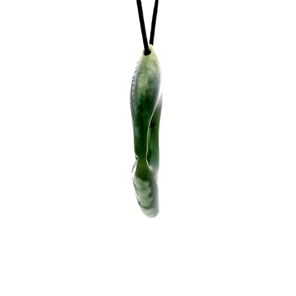 NZ pounamu greenstone fern shaped with koru