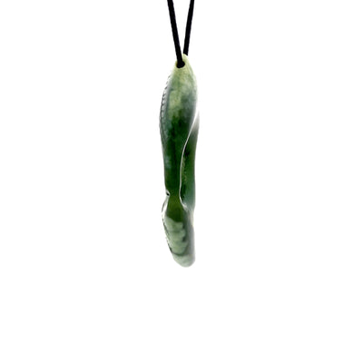 NZ pounamu greenstone fern shaped with koru
