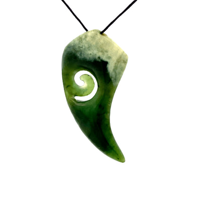 NZ pounamu greenstone fern shaped with koru