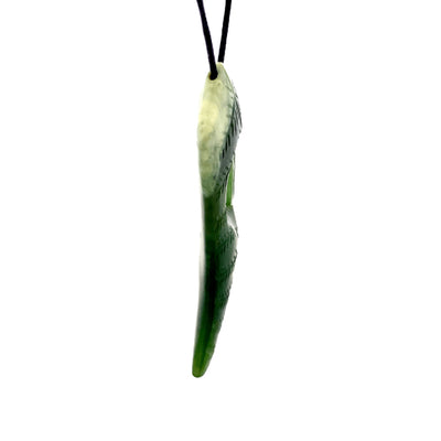 NZ pounamu greenstone fern shaped with koru