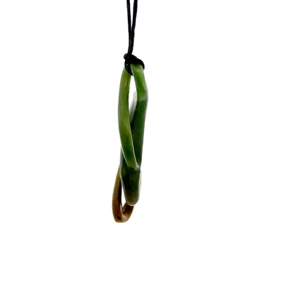 NZ pounamu greenstone twisted pendant on slider cord by Aden Hoglund