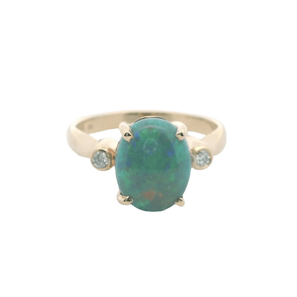 Opal and diamond ring in 9ct yellow gold