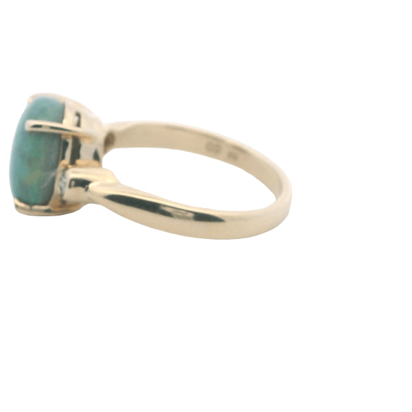Opal and diamond ring in 9ct yellow gold