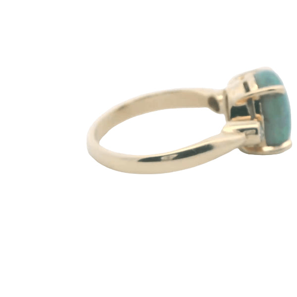 Opal and diamond ring in 9ct yellow gold
