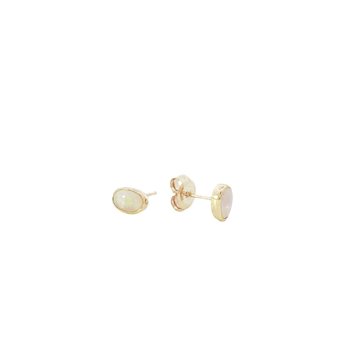 Oval Australian opal rubover stud earrings in 9ct yellow gold