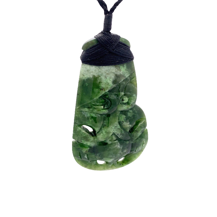 NZ pounamu greenstone bound toki with hei tiki pendant on slider cord