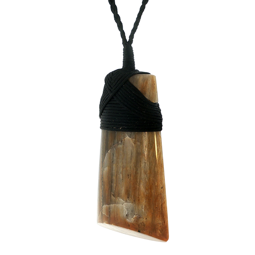 Petrified wood bound toki pendant on slider cord