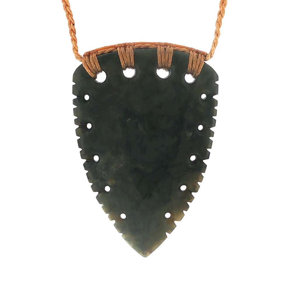 NZ pounamu greenstone notched rei niho or whales tooth pendant on plaited tan slider cord