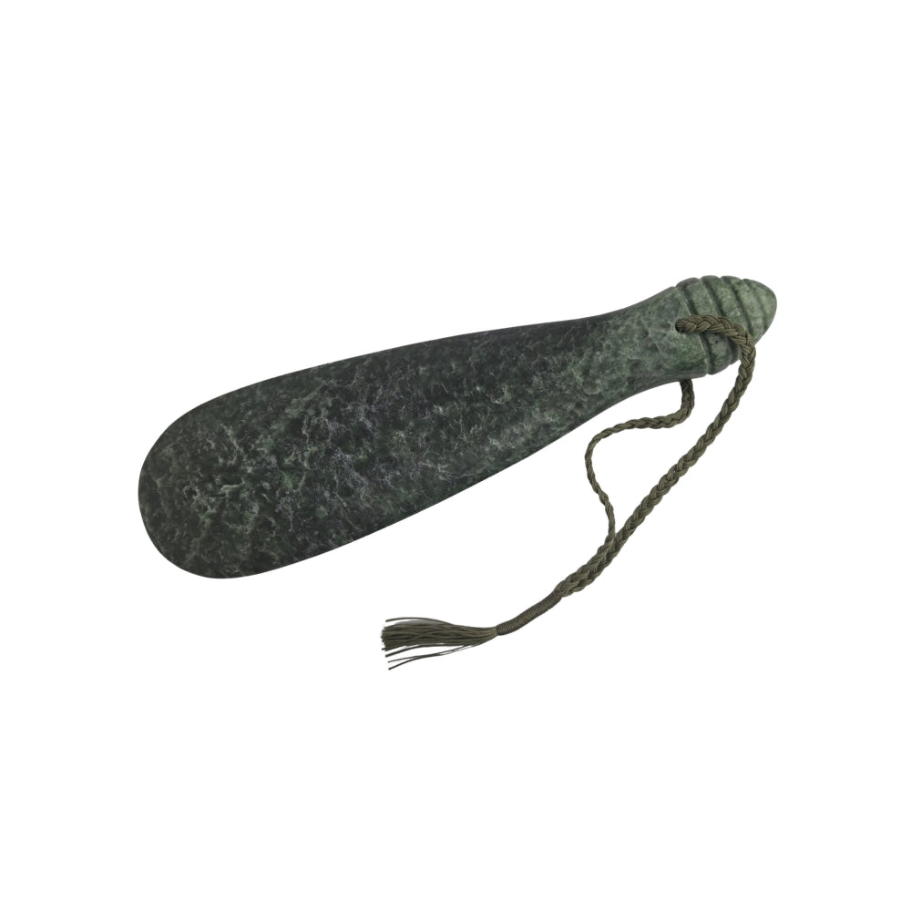 NZ pounamu greenstone mere with green cord and wooden stand