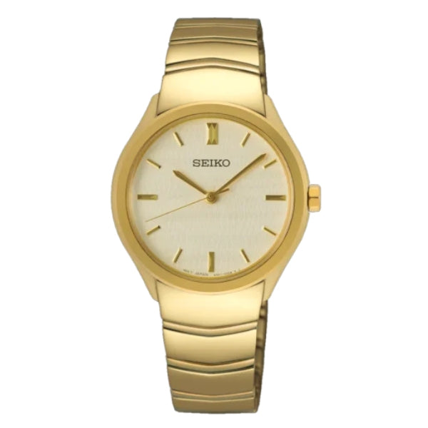 Seiko women's quartz dress watch in gold tone and champagne dial