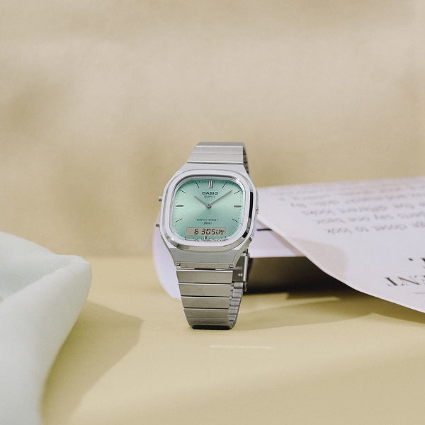 Casio unisex analogue digital dress watch square teal dial in stainless steel