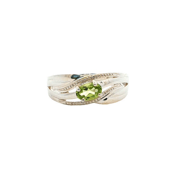 Oval peridot ribbon ring in sterling silver