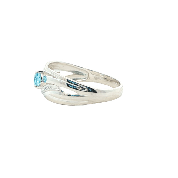 Oval blue topaz ring in sterling silver