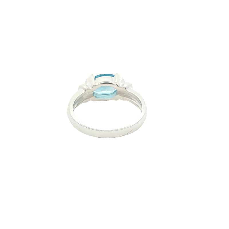 Oval blue topaz semi rubover ring in sterling silver