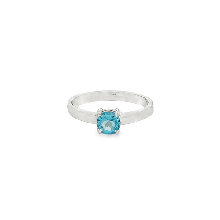 Blue topaz solitaire ring in sterling silver