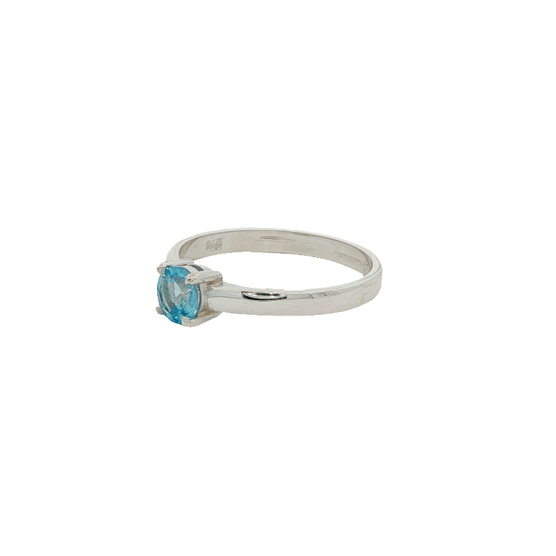 Blue topaz solitaire ring in sterling silver