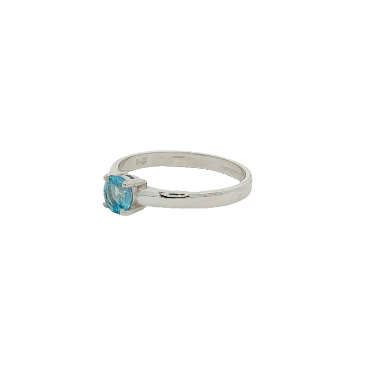 Blue topaz solitaire ring in sterling silver