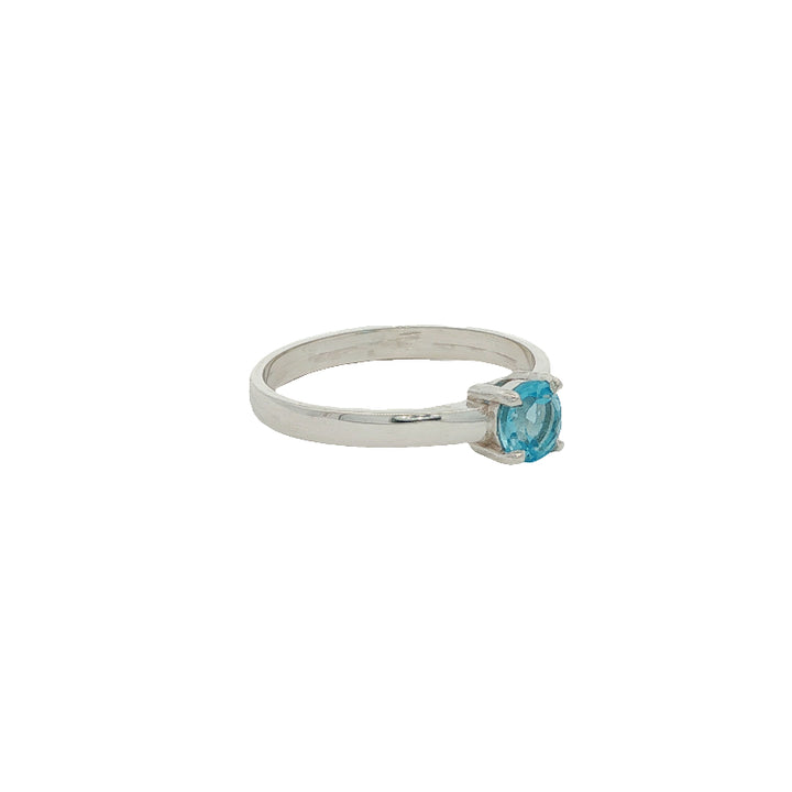 Blue topaz solitaire ring in sterling silver