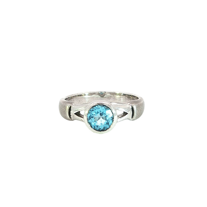 Swiss blue topaz solitaire dress ring with split band in sterling silver