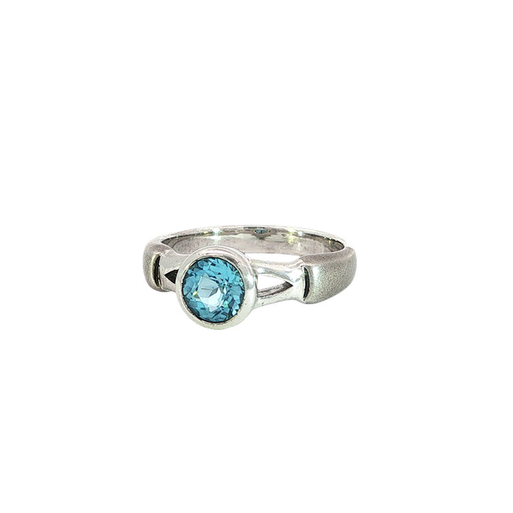 Swiss blue topaz solitaire dress ring with split band in sterling silver