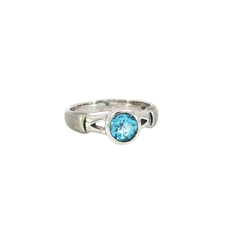 Swiss blue topaz solitaire dress ring with split band in sterling silver