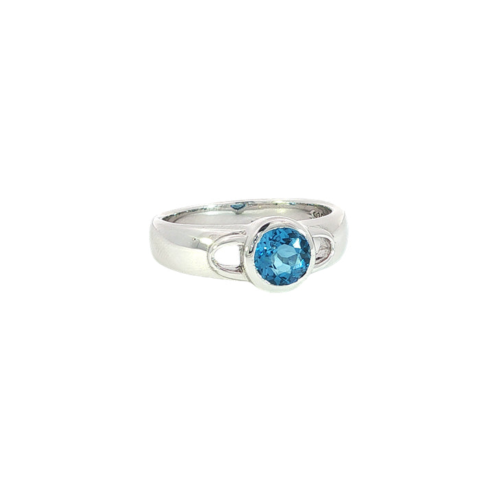Swiss blue topaz solitaire ring in sterling silver