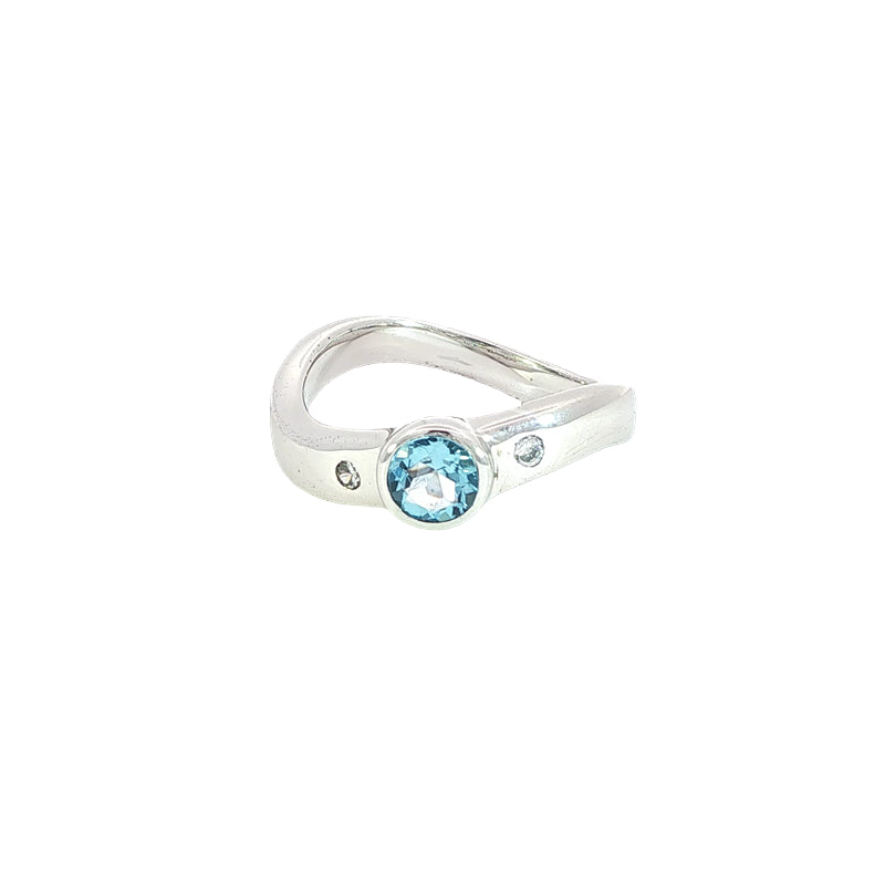 Swiss blue topaz and cz ring on curved band in sterling silver