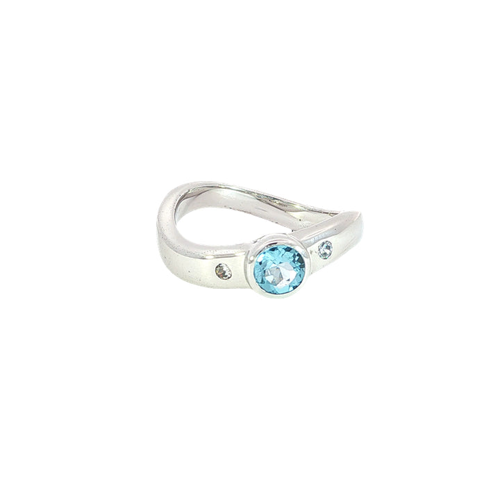 Swiss blue topaz and cz ring on curved band in sterling silver