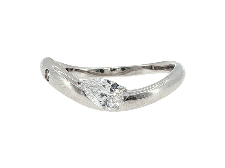 Curved ring with pear cz and bezel set cz in sterling silver