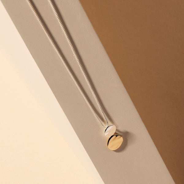 Najo - Shard beaten double disc pendant in sterling silver and gold plate on box chain - 42cm