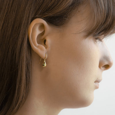 Teardrop fixed hook earrings in yellow gold tone over sterling silver