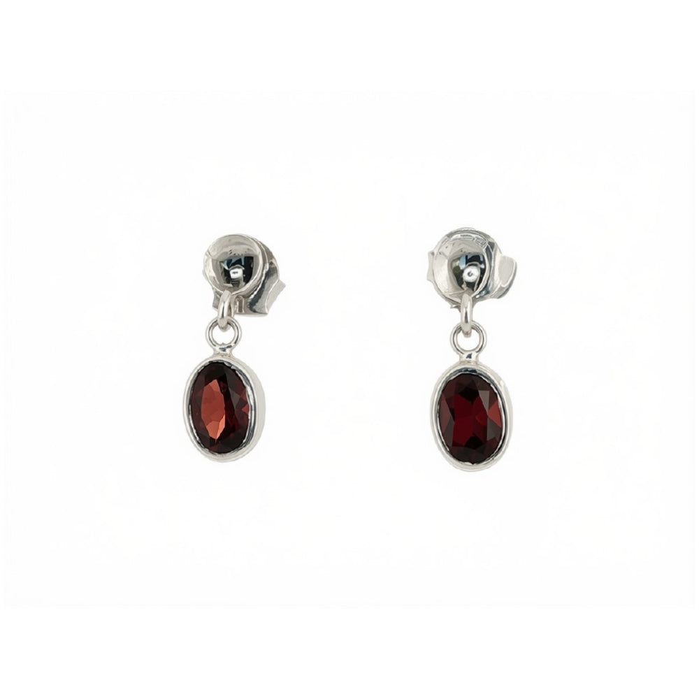 Oval garnet drop earrings on studs in sterling silver