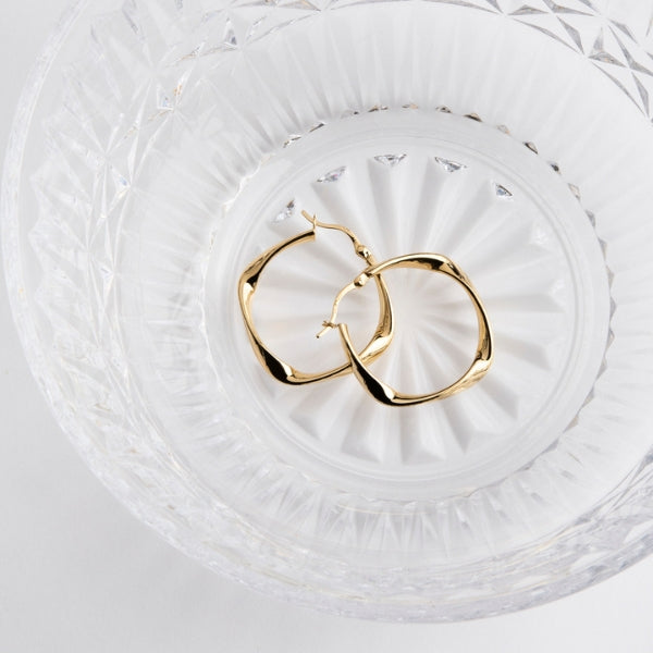 Najo - Garden of eden hollow tube square twist hoops in gold plated sterling silver 29mm