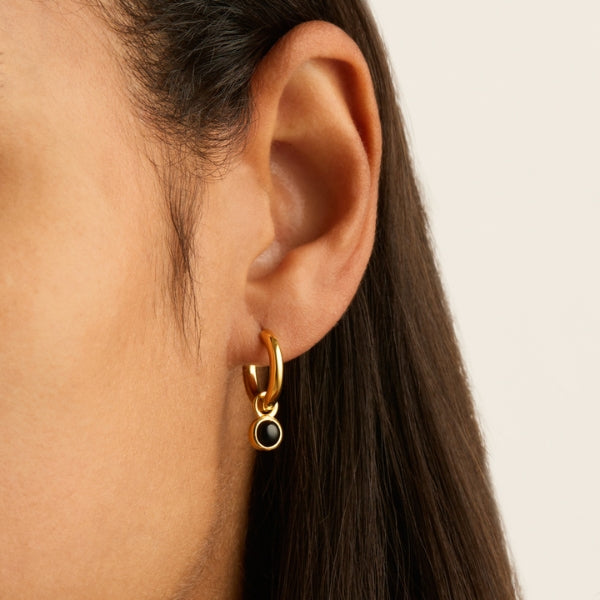 Najo - huggie earrings with onyx drop in gold plated sterling silver