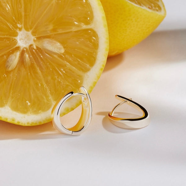 Najo - The plunge asymmetric tapered hoop earrings in sterling silver