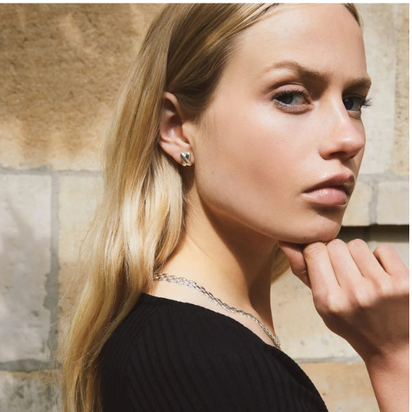 Siver X shaped Kiss stud earrings from Najo