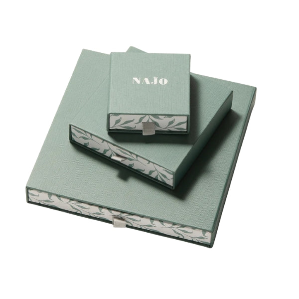 Najo - Petal huggie earring with teardrop charm in sterling silver