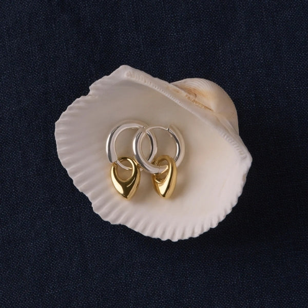 Najo - Petal huggie earrings in sterling silver with gold plated teardrop charm