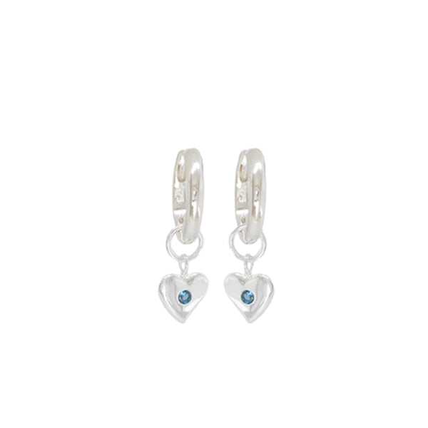 Huggie earrings with heart charm set with london blue topaz in sterling silver