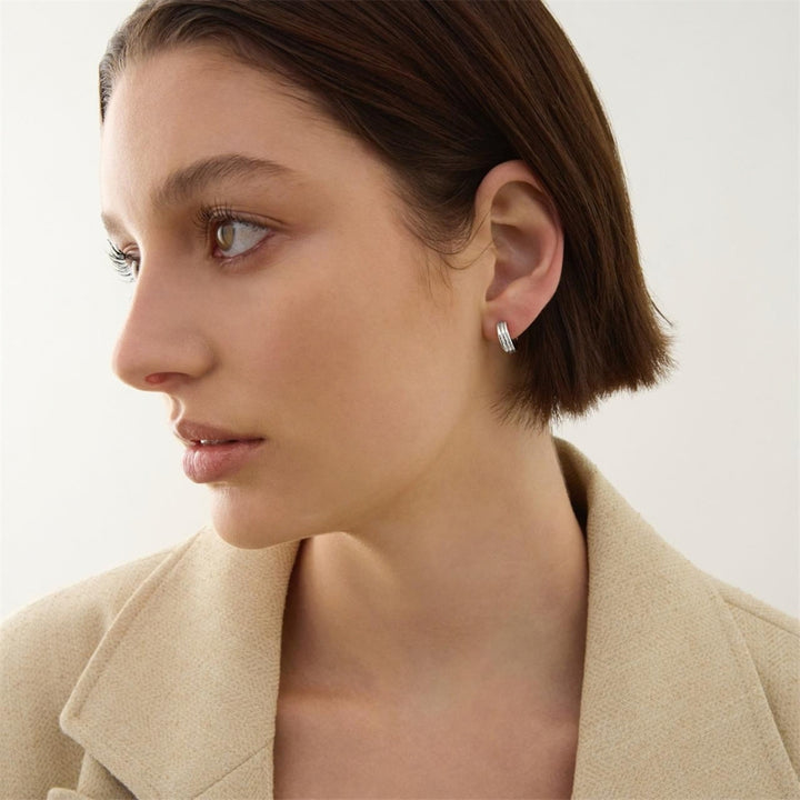Najo - the carrousel huggie earrings in sterling silver