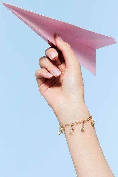 Karen Walker mini rocket charm in sterling silver
