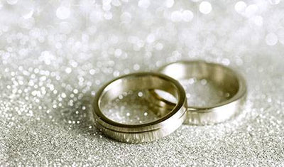 two white gold wedding rings